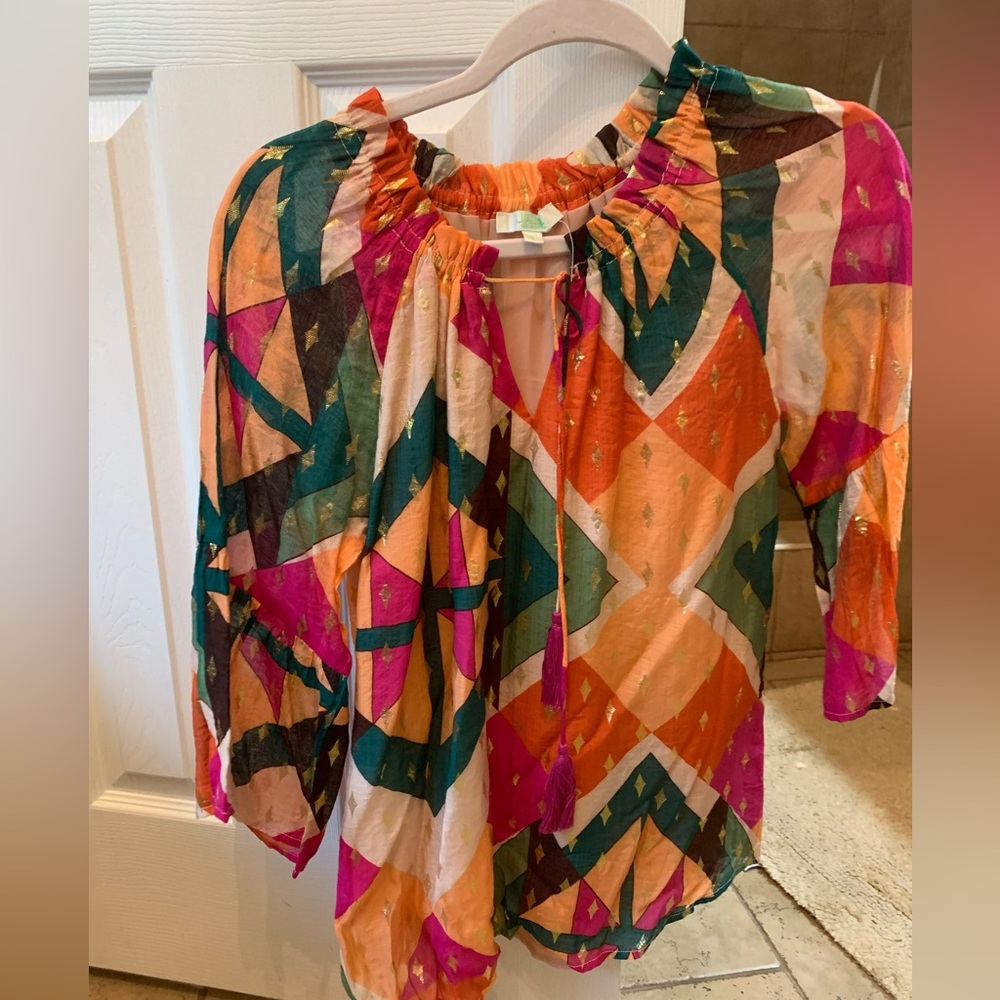 Designer top each sold separately